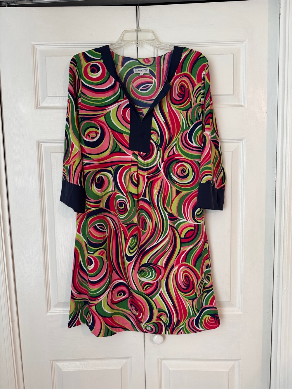 Vibrant Multicolor Swirl V-Neck Tunic Dress with Navy Trim